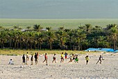 Yemen, Socotra Governorate, Socotra Island, listed as World Heritage by UNESCO, Qalansiyah, small fishing village, boys playing football