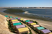 Morocco, Western Sahara, Dakhla, colorful roofs of the hotel PK25 facing the lagoon and the desert mountains