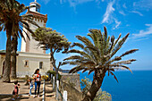 Morocco, Tangier Tetouan region, Tangier, Moroccan woman and her children at the foot of the cape spartel lighthouse overlooking the Mediterranean