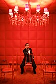 France, Paris, Royal Monceau hotel, Julie Eugene, art concierge of the Royal Monceau, in the red smokehouse of the hotel designed by Philippe Starck