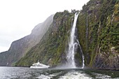 New Zealand, South Island, Southland region, Fiordland National Park, Unesco World Heritage Site, waterfall in Milford Sound