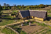 France, Calvados, Herouville Saint Clair, Domaine de Beauregard, Ornavik Historical Park, reconstruction of a Carolingian village with its artisans and farmers, the big farm (aerial view)