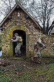 France, Eure, old wash-house of Sainte Colombe prés Vernon, Allied Reconstitution Group (US World War 2 and french Maquis historical reconstruction Association), reenactors in uniform of the 101st US Airborne Division
