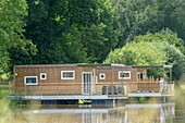 France, Morbihan, Guegon, the floating houses of Ti war an dour on a meander of the Ust river