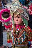 Vietnam, Lao Cai province, Sa Pa city, Black Hmong ethnic minority, street girl in traditional costume