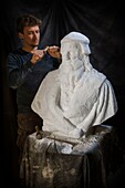 France, Indre et Loire, Chemille sur deme, the sculptor Ianek Kocher sculpting the bust of Leonardo da Vinci in Carrara marble in his workshop for the 500 years of the death of Leonardo da Vinci at the castle of Amboise
