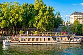 France, Paris, area listed as World Heritage by UNESCO, the banks of the Seine, quay Henri IV, barge restaurant