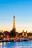France, Paris, area listed as World Heritage by UNESCO, the banks of the Seine, the Alexandre III bridge and the Eiffel Tower