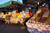 Morocco, High Atlas, Marrakesh, Imperial City, medina listed as World Heritage by UNESCO, Jemaa El Fna square, fruit seller