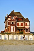 France, Somme, Baie de Somme, Le Crotoy, Belle-Epoque villa and beach cabines along Jules-Noiret promenade