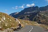 France, Savoie, Massif des Cerces, Valloire, cycling climb of the Col du Galibier, one of the routes of the largest cycling area in the world, last kilometer before the summit and rock of the great Pare