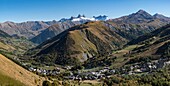 France, Savoie, Saint Jean de Maurienne, the largest cycling area in the world was created within a radius of 50 km around the city. At the cross of the Iron Cross (2067 m) panoramic view of Saint Sorlin d'Arves and the needles of Arves