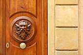 Italy, Tuscany, Siena, historical center listed as World Heritage by UNESCO, detail of a door