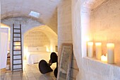 Italy, Basilicata, Matera, European Capital of Culture 2019, troglodyte old town listed as World Heritage by UNESCO, Sasso Caveoso, hotel Corte San Pietro, room dug in the tuff