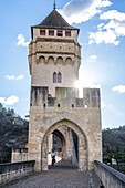 France, Lot, Quercy, Cahors, The Valentre bridge above Lot river, dated 14 th. century, listed as World Heritage by UNESCO