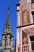 France, Haut Rhin, Mulhouse, Place de la Reunion, Detail of the facade of the town hall and the tower of the temple st Etienne in the background