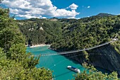 France, Isere, Trieves, Monteynard Lake, footbridge hiking trail, Ebron footbridge and Mira boat