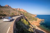 France, Var, Saint Raphael, littoral road of the Corniche d'Or, creek of Petit Caneiret to Antheor, in the background the Esterel massif and the peaks of the Cap Roux