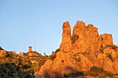France, Var, Frejus, Esterel massif, the watchtower on Mount Vinaigre (641m) serves as a surveillance post for fires, cliffs of red rhyolite rocks of volcanic origin