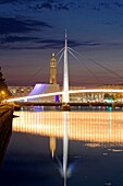 France, Seine Maritime, Le Havre, city rebuilt by Auguste Perret listed as World Heritage by UNESCO, Footbridge of the Bassin du Commerce by Guillaume Gillet (1969), Volcano of architect Oscar Niemeyer and lantern tower of Saint Joseph's church