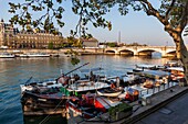 France, Paris, area listed as World Heritage by UNESCO, the barges at the Port des Tuileries with the Palais Bourbon in the background