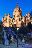 France, Paris, Montmartre hill, Sacre Coeur Basilica at nightfall