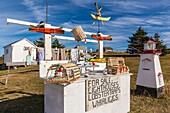 Canada, Nova Scotia, Cabot Trail, Neils Harbour, Cape Breton HIghlands National Park, stand selling local crafts and souvenirs