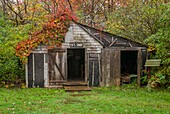 Canada, Nova Scotia, Digby, Maud Lewis House Replica built by Murray Ross, perfect replica of painter Maude Lewis's house now on display at the Art Gallery of Nova Scotia in Halifax, garage of Everett Lewis, husband of Maud Lewis, ER-CAN-18-02