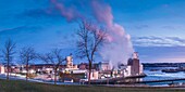 Canada, New Brunswick, Saint John, Pulp and Paper factory by the Reversing Falls, dawn