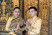 Laos, Luang Prabang, Vat Xieng Thong, young married couple