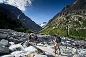 France, Isere, massif of Oisans, National Park of the Ecrins, in the hamlet of Berarde, hiking towards the refuge Temple Ecrins passage of the torrent of Pilatte in the bottom Bans (3669m)