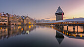 Kapellbrucke (Chapel Bridge) at sunrise in winter, wooden footbridge, Lucerne, Switzerland, Europe