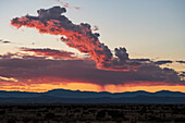Usa, New Mexico, Santa Fe, Dramatic sky over High Desert at sunset