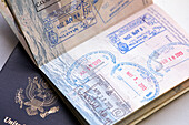 Studio shot of US passports with stamps