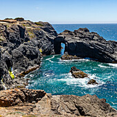 USA, Oregon, Brookings, View of rocky natural arch over sea 