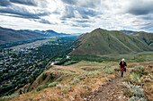 USA, Idaho, Bellevue, Senior woman hiking Carbonate Mountain trail
