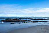 South Africa, Hermanus, Rocky coast and Kammabaai Beach at sunny day