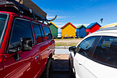 Cars parked near Muizenberg Beach