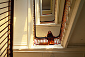 Low angle view of teenage girl (16-17) standing in staircase