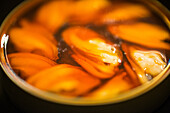 Close-Up of Spicy Mussels in Tin