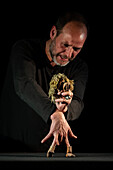 Puppeteer Javier Aranda performs his play "Vida"