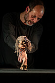 Puppeteer Javier Aranda performs his play "Vida"