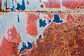 Canada, Manitoba, St. Lupicin. Close-up of rusted paint patterns on vintage car.