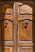 Gordes, Vaucluse, Provence-Alpes-Cote d'Azur, France. An old wooden door in Provence.