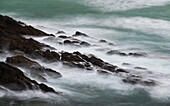Ireland, County Kerry, Dunmore Head. Scenic of waves on shore rocks.