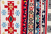 Romania. Traditional textile, woven designs on cloth.