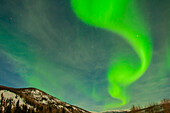 USA, Alaska, Chena Hot Springs Resort. Aurora Borealis und Sterne am Nachthimmel.