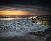 USA, New Jersey, Cape May National Seashore. Sunrise on ocean shore.