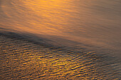 USA, New Jersey, Cape May National Seashore. Sunrise on ocean shore.