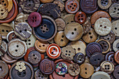 Close-up of variety of buttons.